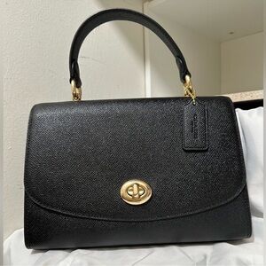 Coach Black Leather Satchel with Elegant Gold Accents